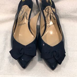 Navy patent leather shoes.